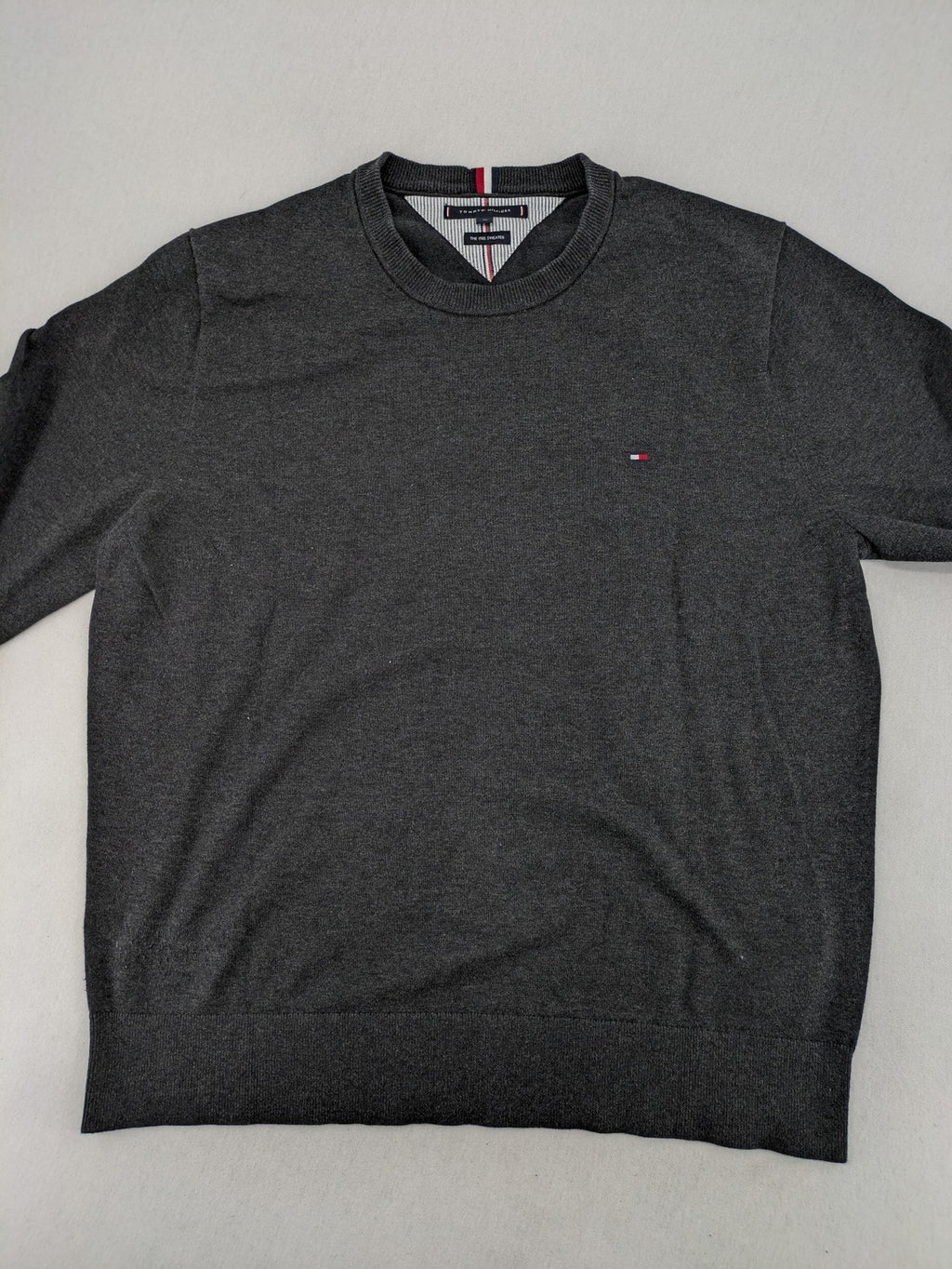Tommy Hilfiger grey turtle neck jumper with embroidered flag logo on chest.