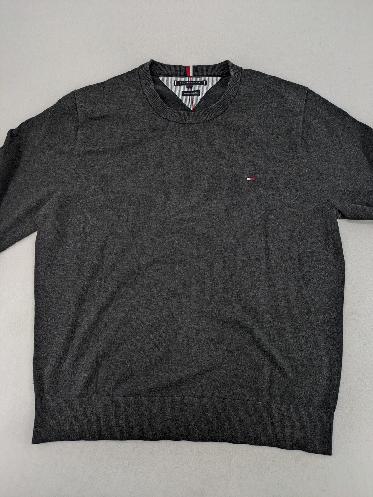 Tommy Hilfiger grey turtle neck jumper with embroidered flag logo on chest.
