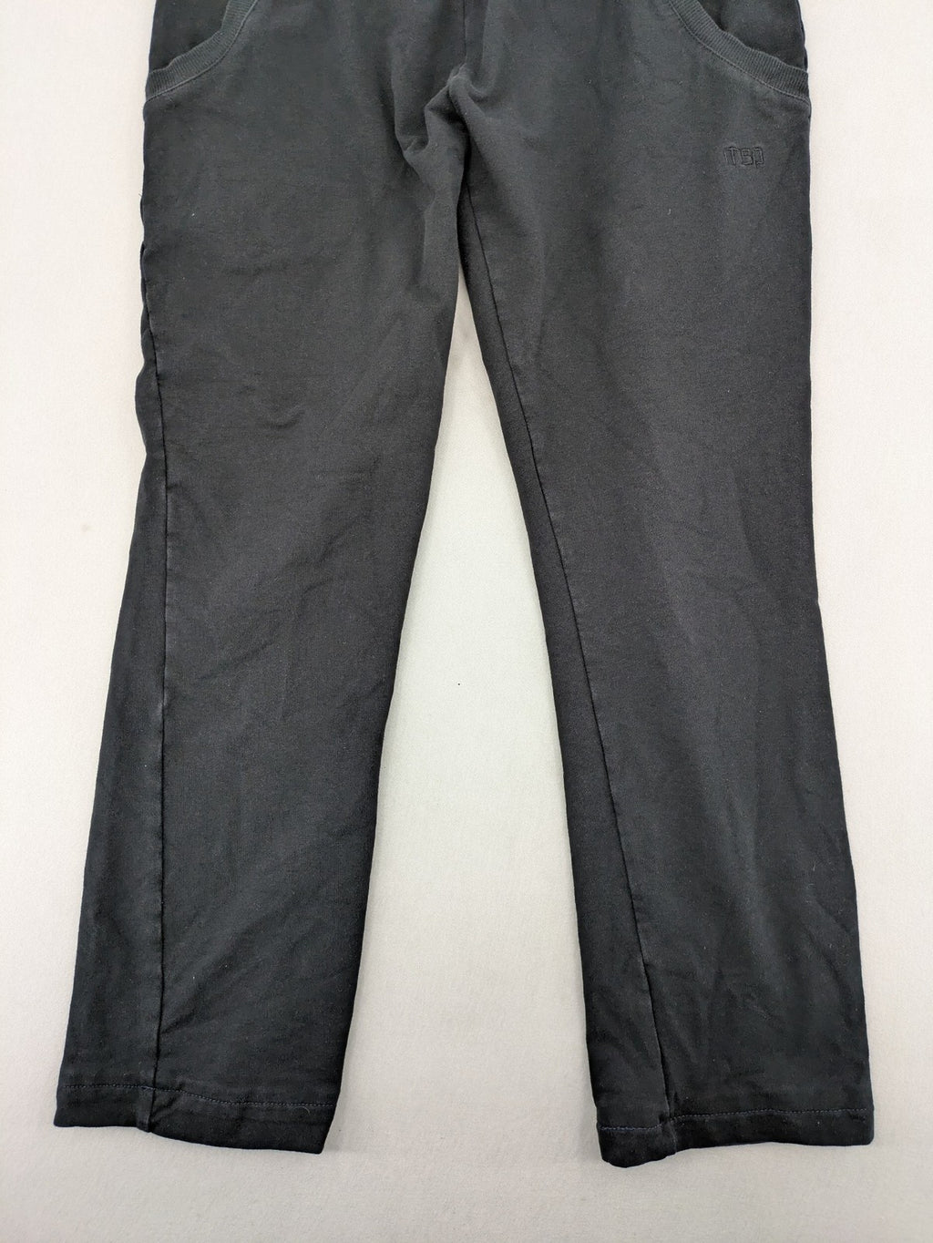 Manguun Sports grey jogger pants soft cotton blend with subtle logo embroidery and elastic waistband.