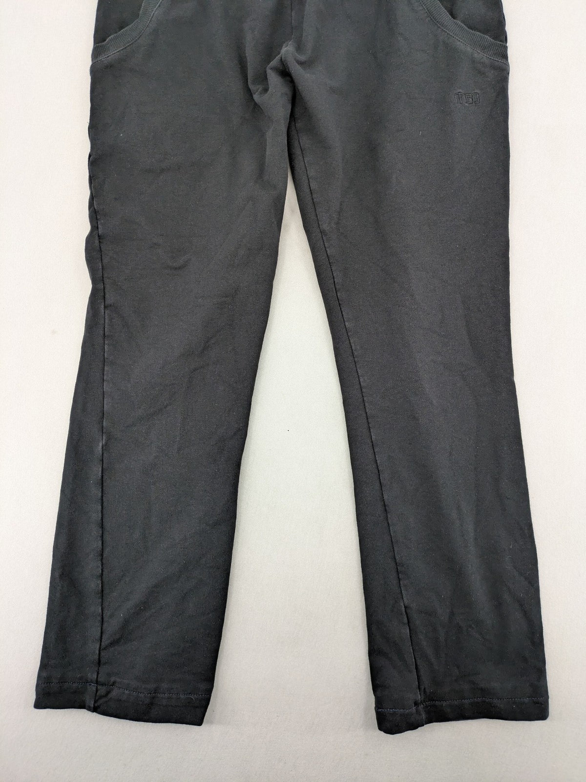 Manguun Sports grey jogger pants soft cotton blend with subtle logo embroidery and elastic waistband.