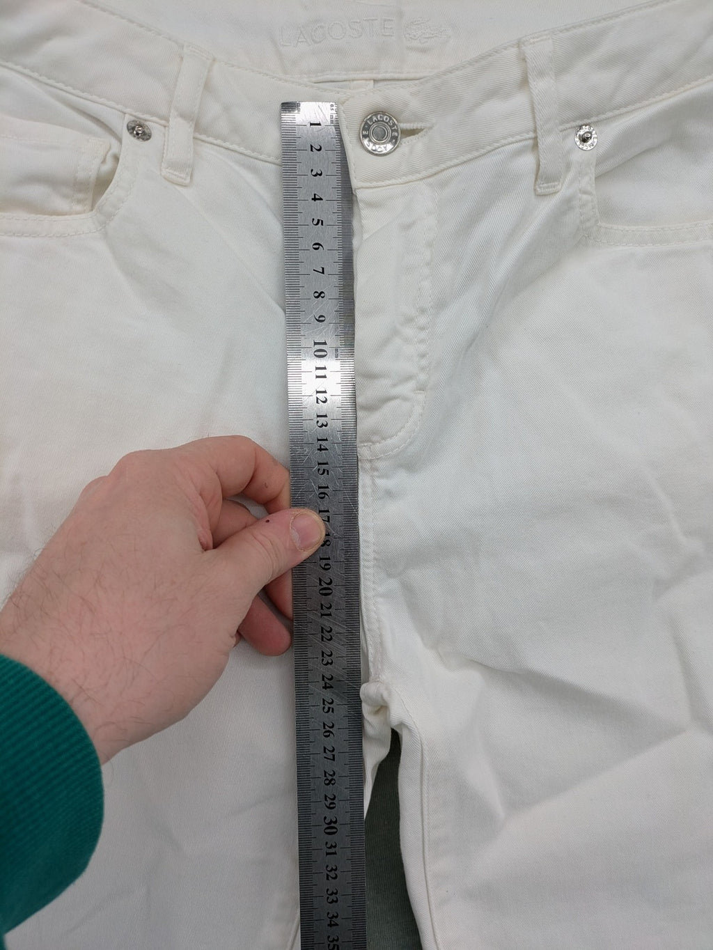 Lacoste white straight jeans high rise slim fit with logo and stretch denim material.
