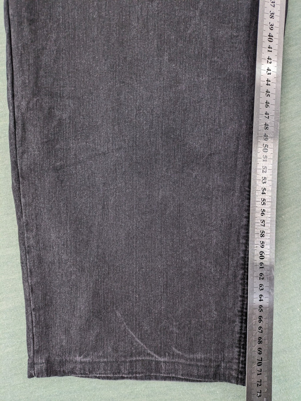 Charles Vögele grey straight jeans with elastic waistband and decorative studs on pockets.