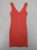 Zebra orange bodycon mini dress with deep V-neck and sleeveless design.