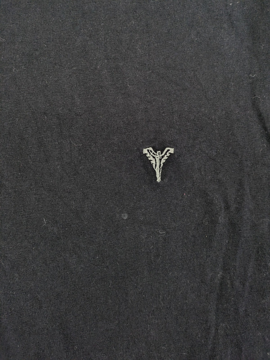 Carlo Colucci grey t-shirt with embroidered logo on chest and brand label details.