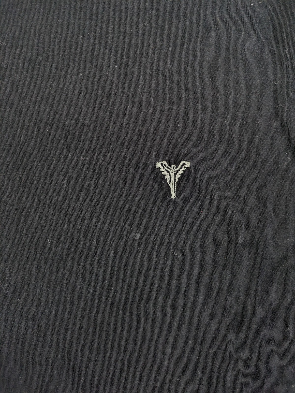 Carlo Colucci grey t-shirt with embroidered logo on chest and brand label details.