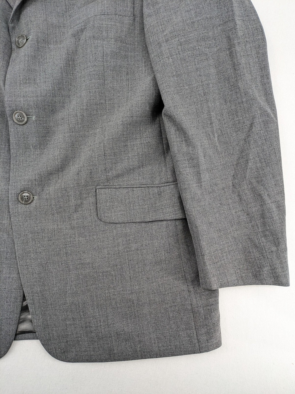 Montego grey blazer three-button design made from wool blend with smooth lining.