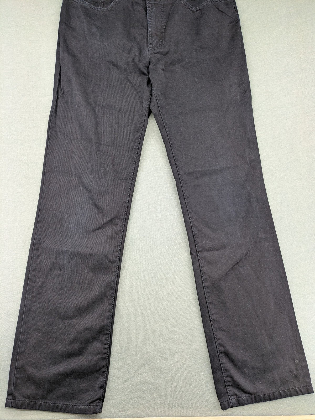 Joker black straight jeans five-pocket design with prominent stitching and brand details.