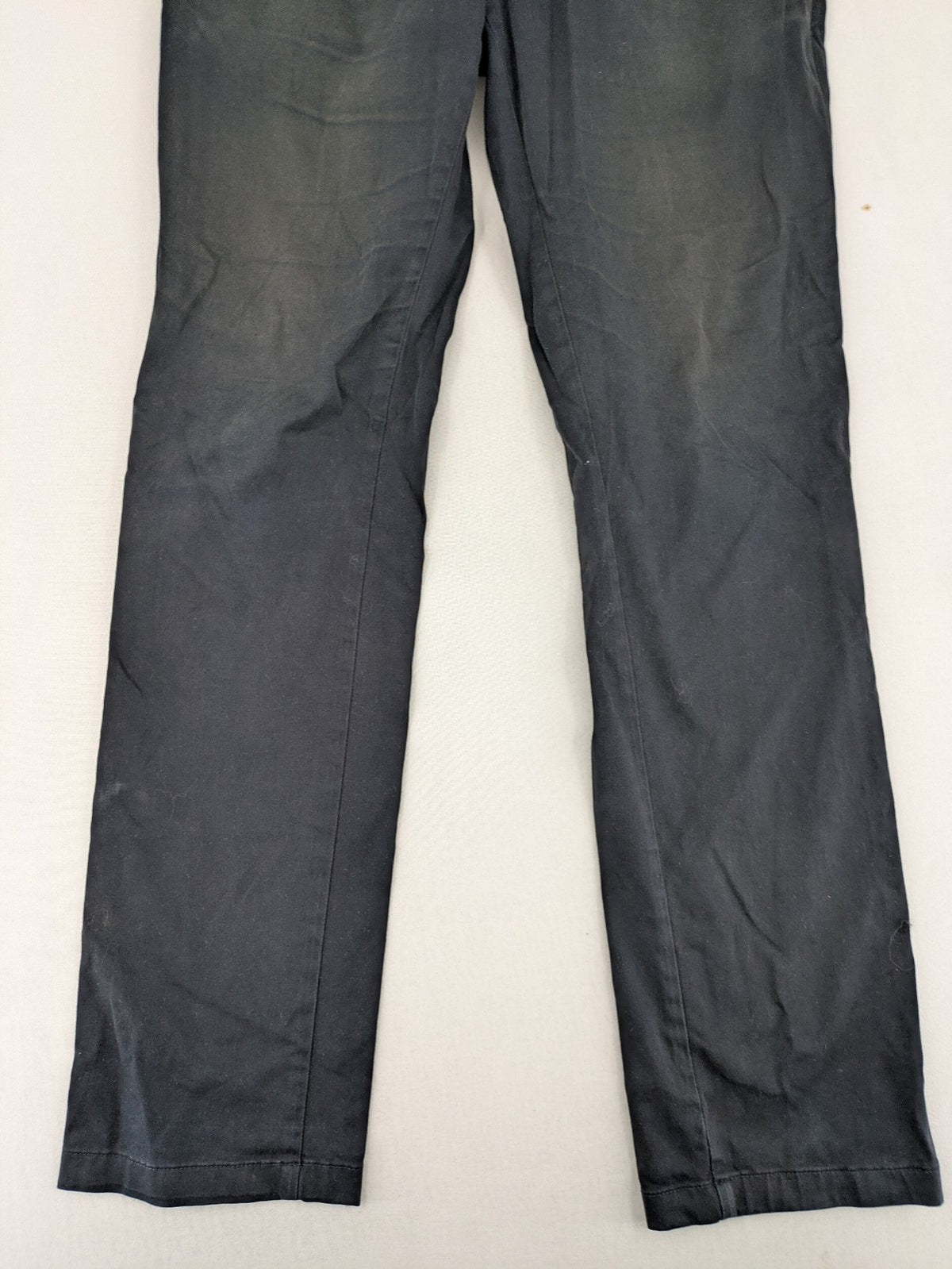 Tommy Hilfiger grey chino pants with TH-Flex stretch technology and classic straight fit design.