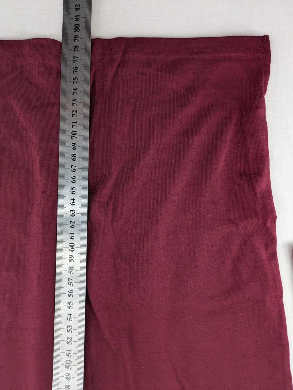 Jan Vanderstorm burgundy Henley shirt with button placket and "087 JV DEPT" graphic print.