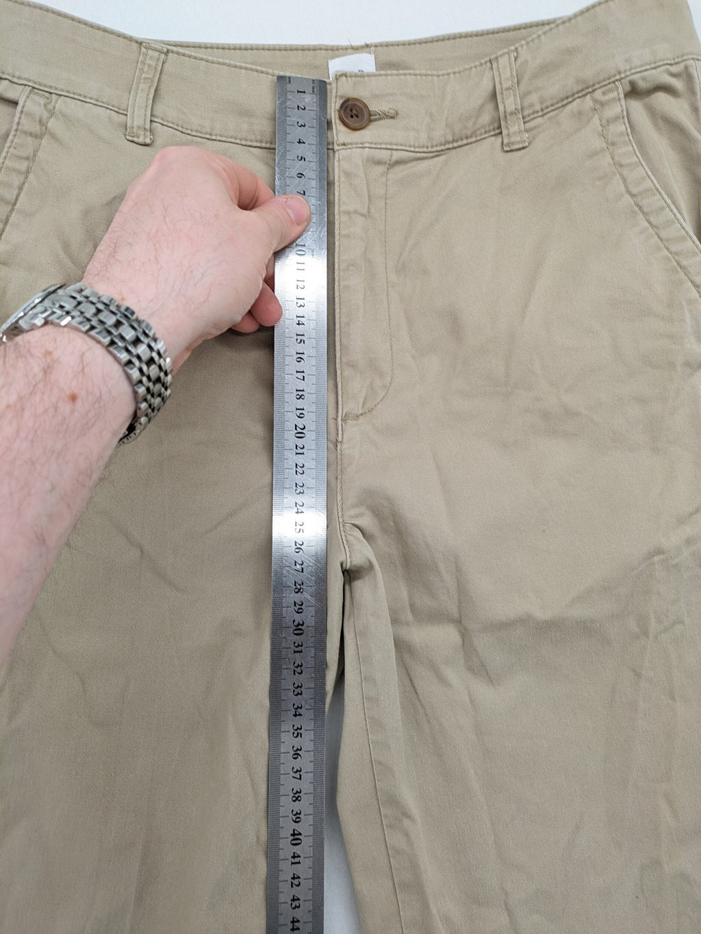 Gap beige girlfriend chino pants with relaxed fit and soft cotton-stretch blend.