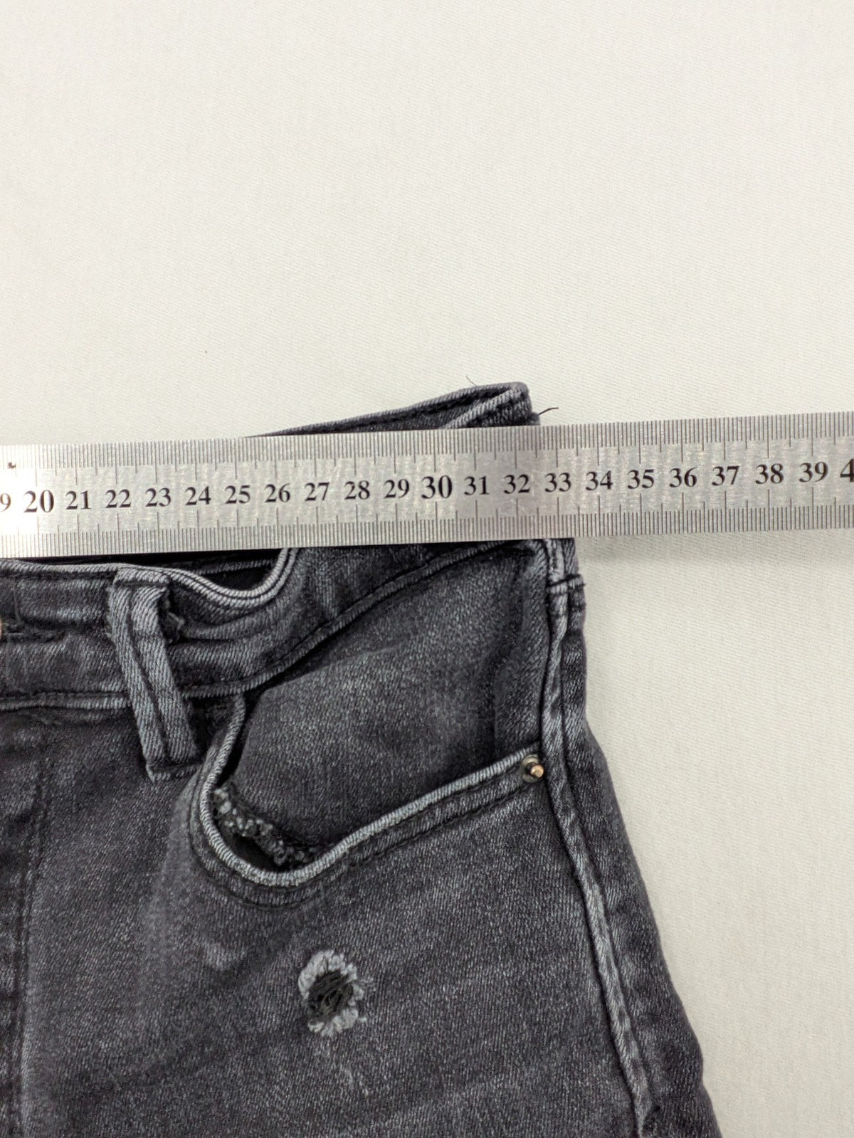 Stradivarius grey skinny jeans super high waist distressed with classic five-pocket design.