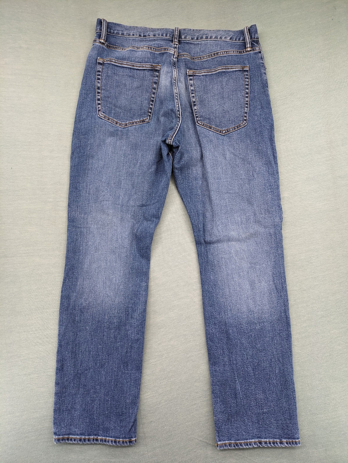 Gap blue straight jeans slim stretch fit with classic denim wash and logo tag.