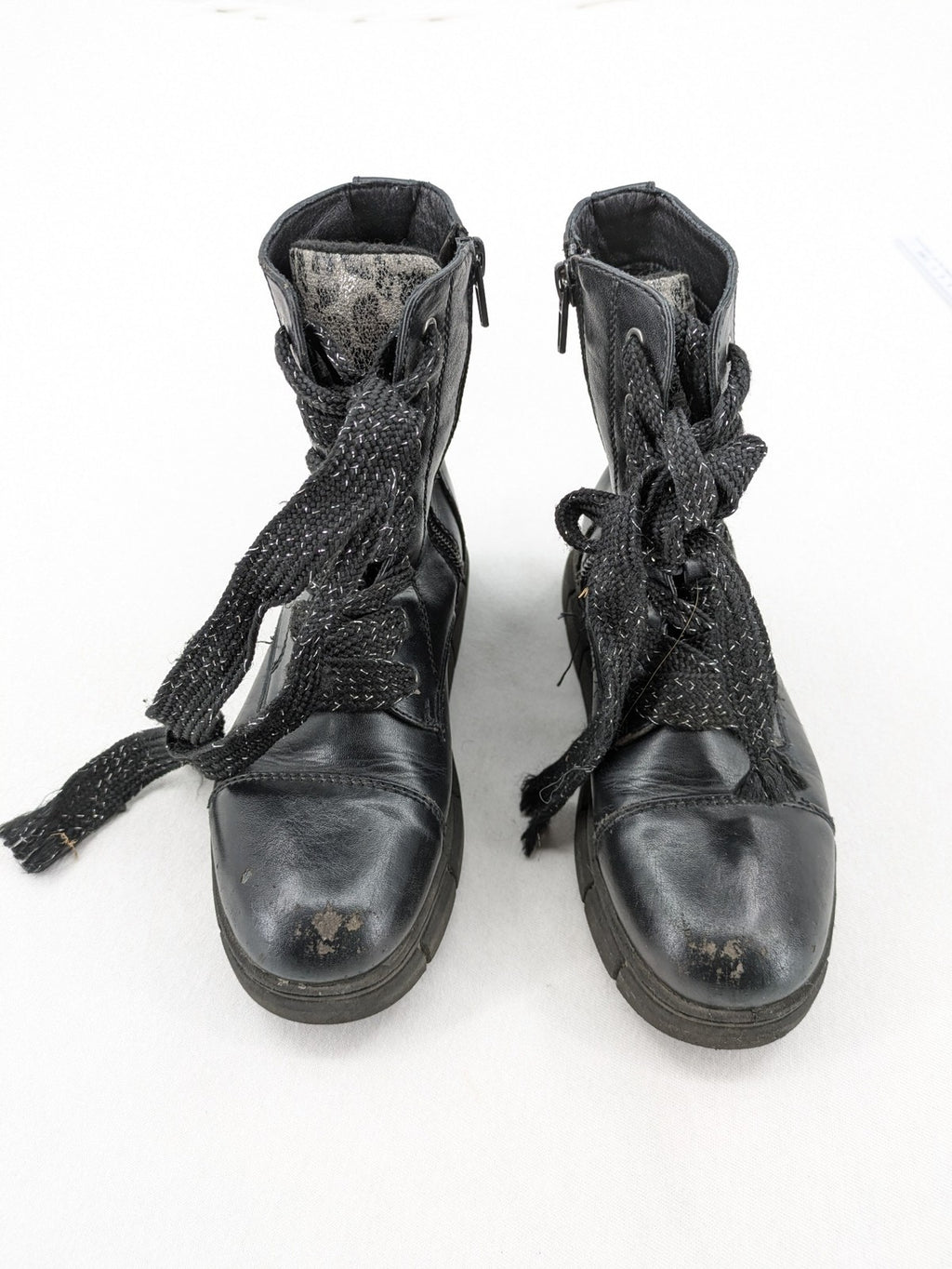 Graceland black combat boots with front lacing and chunky platform sole.