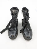 Graceland black combat boots with front lacing and chunky platform sole.