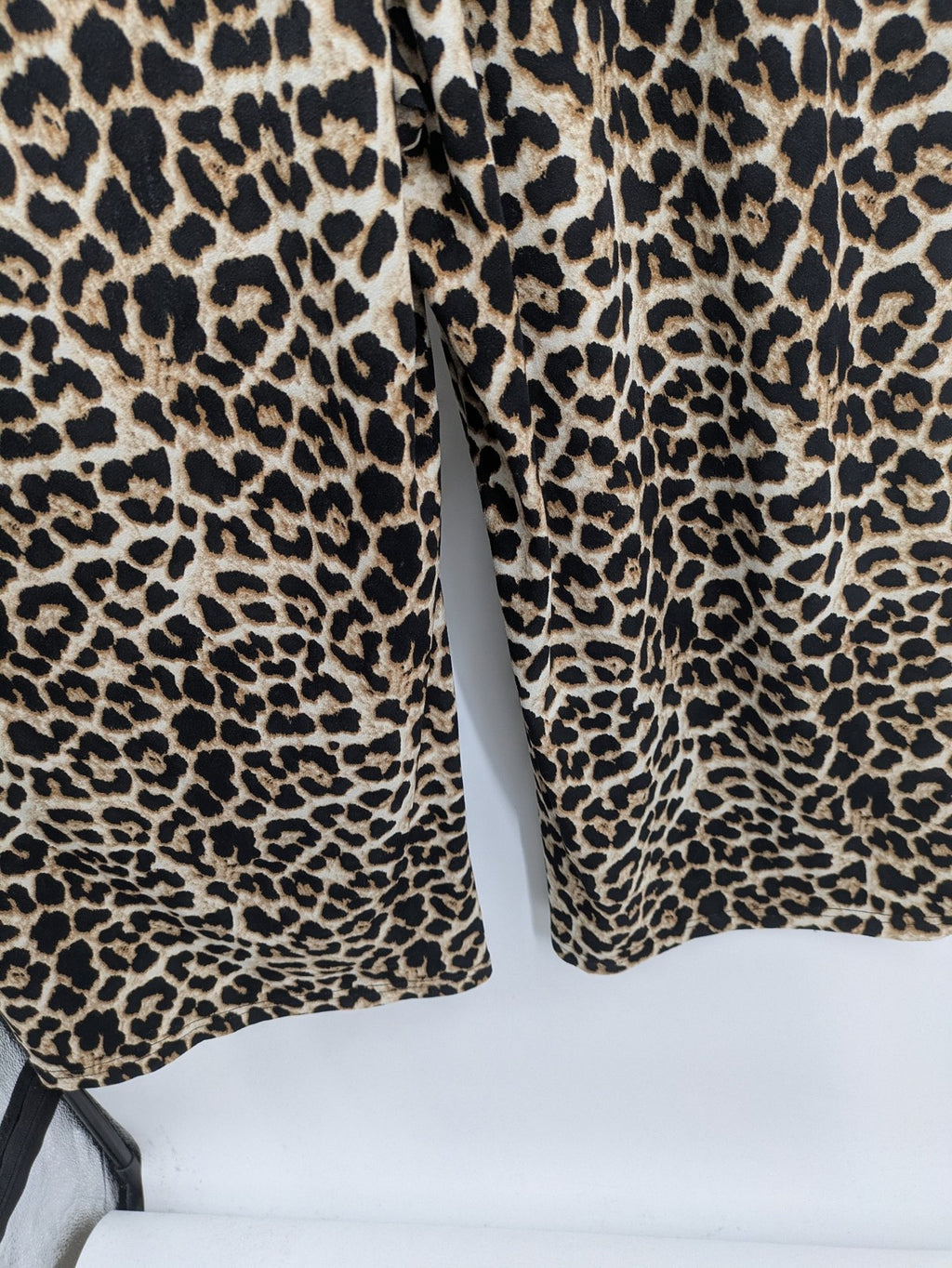 Amisu beige jumpsuit leopard print V-neck, short sleeves, keyhole back detail.
