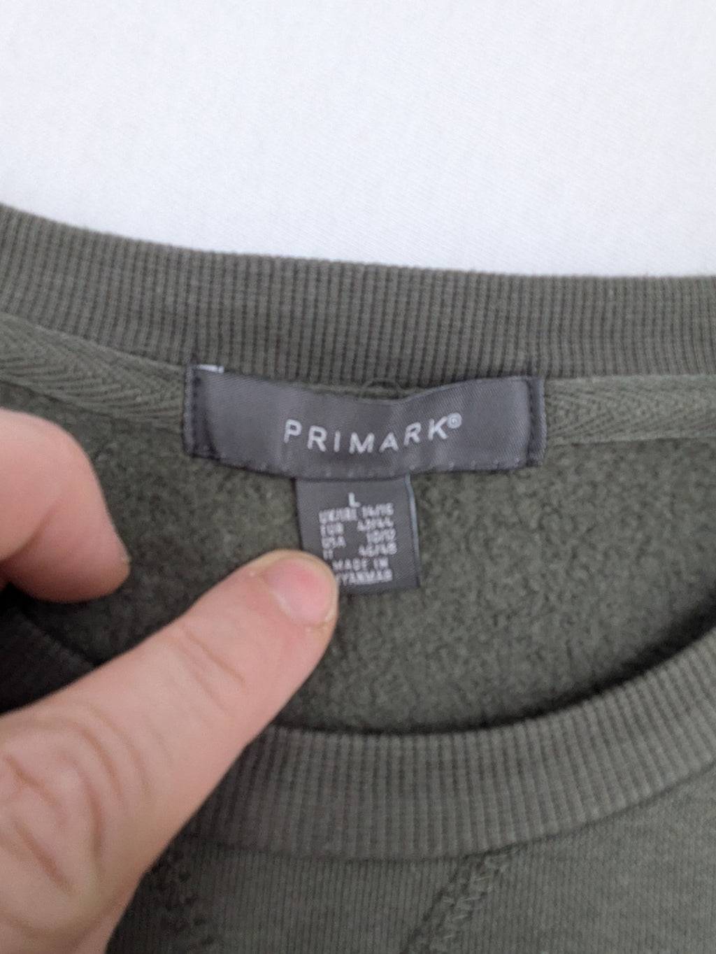 Dragon Ball Z blue sweatshirt featuring Son-Goku graphic and Primark logo.
