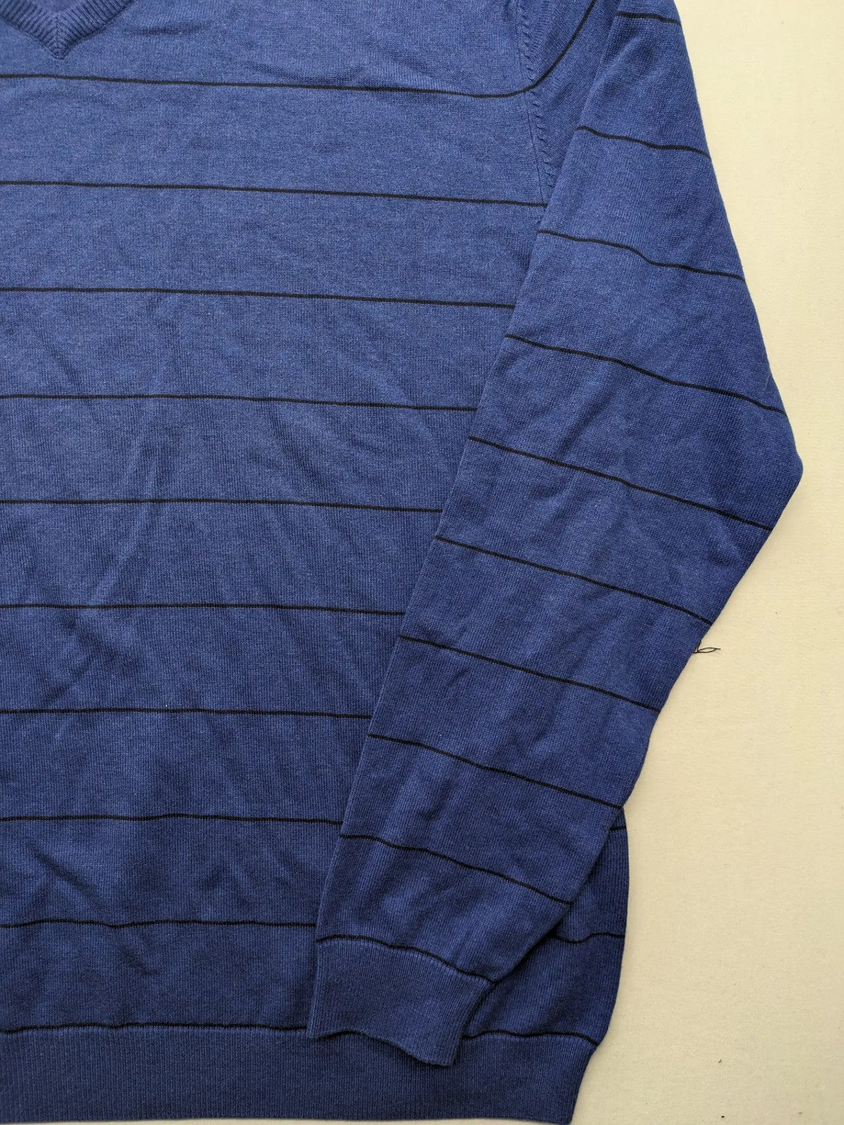 Angelo Litrico blue and navy striped turtle neck jumper with V-neck and cotton material.