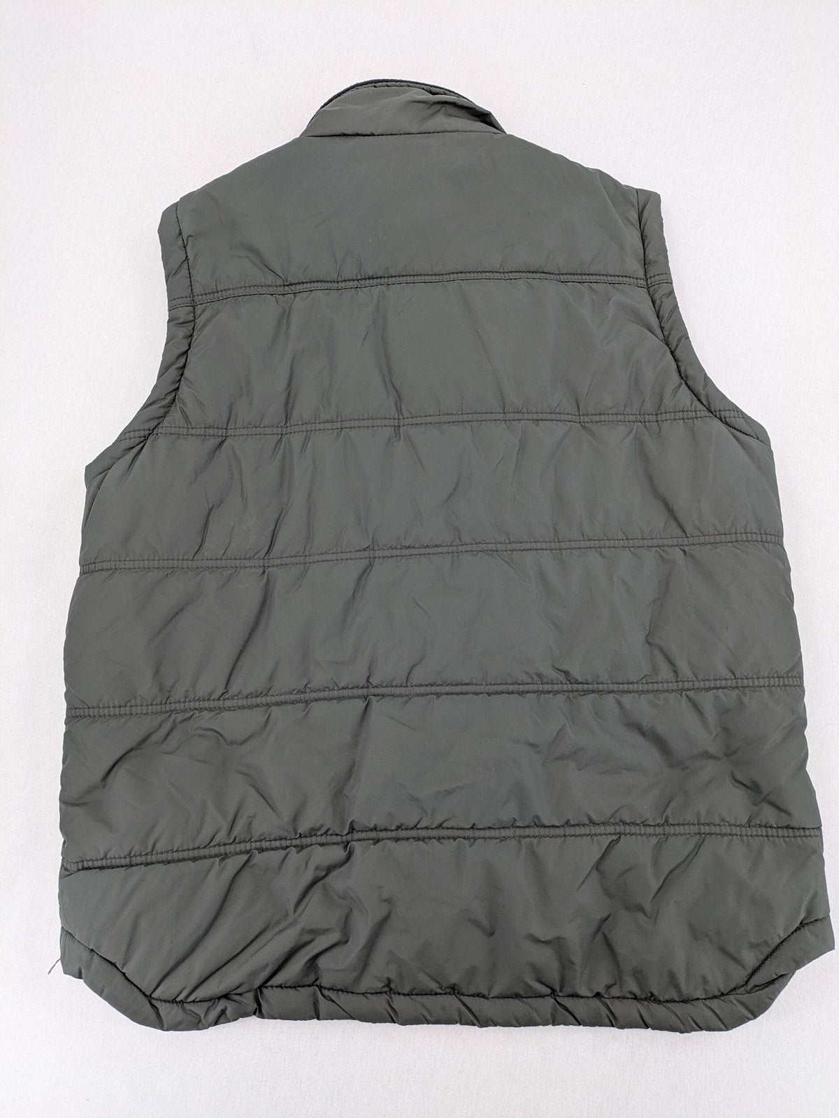 Camargue grey quilted jacket with fleece collar and buttoned pockets.
