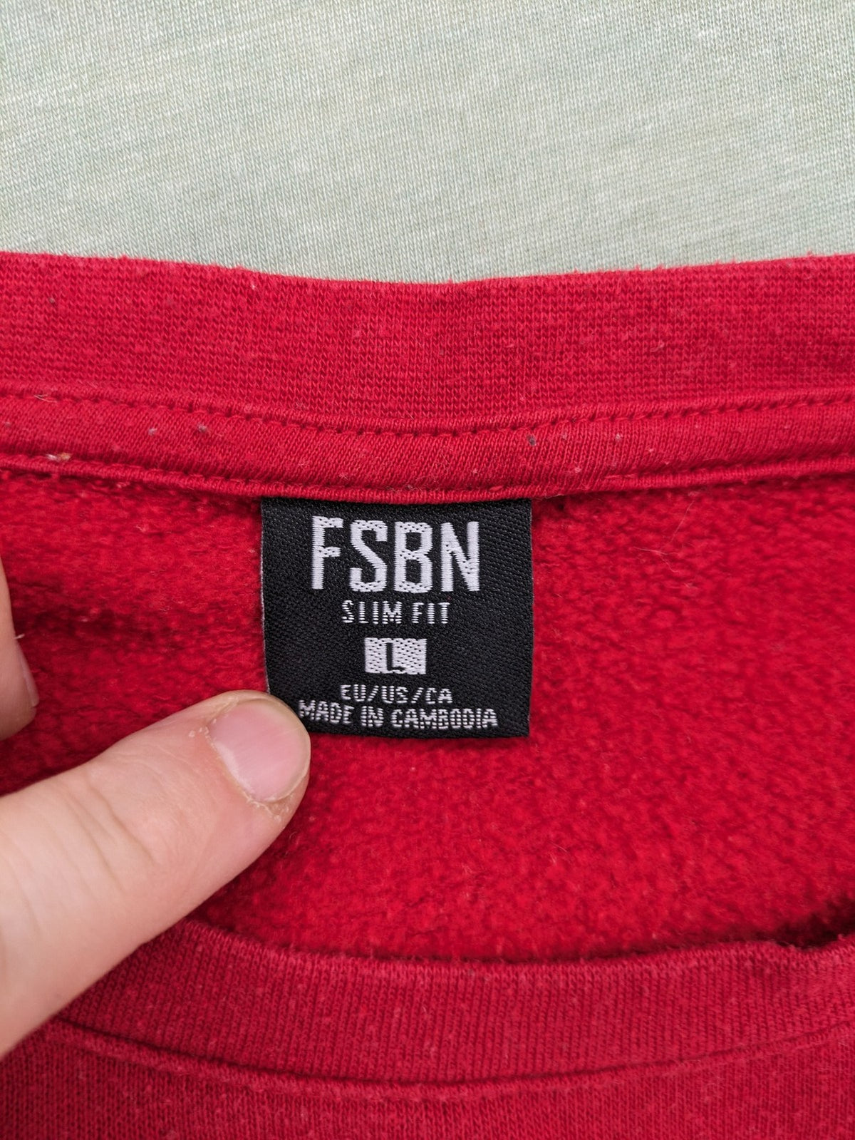 FSBN red turtle neck jumper with "Straight Outta My Bed" graphic print and slim fit.
