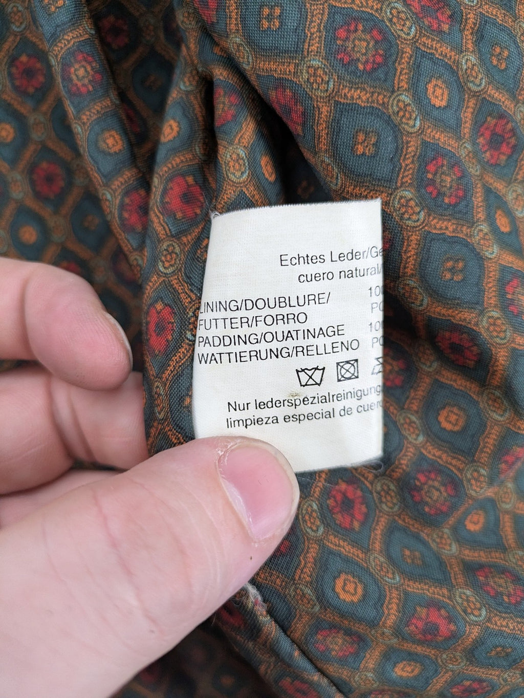 Sonderson grey leather jacket size 52, robust design with patterned lining and YKK zipper.