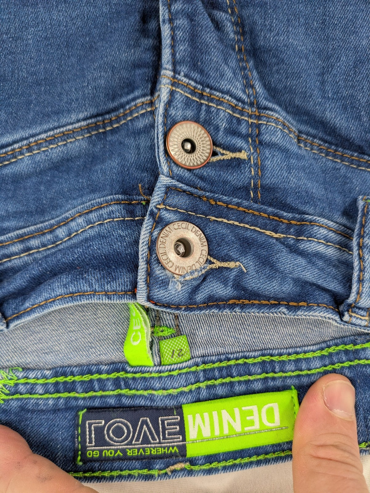 Cecil blue straight jeans with neon green accents and classic 5-pocket design.