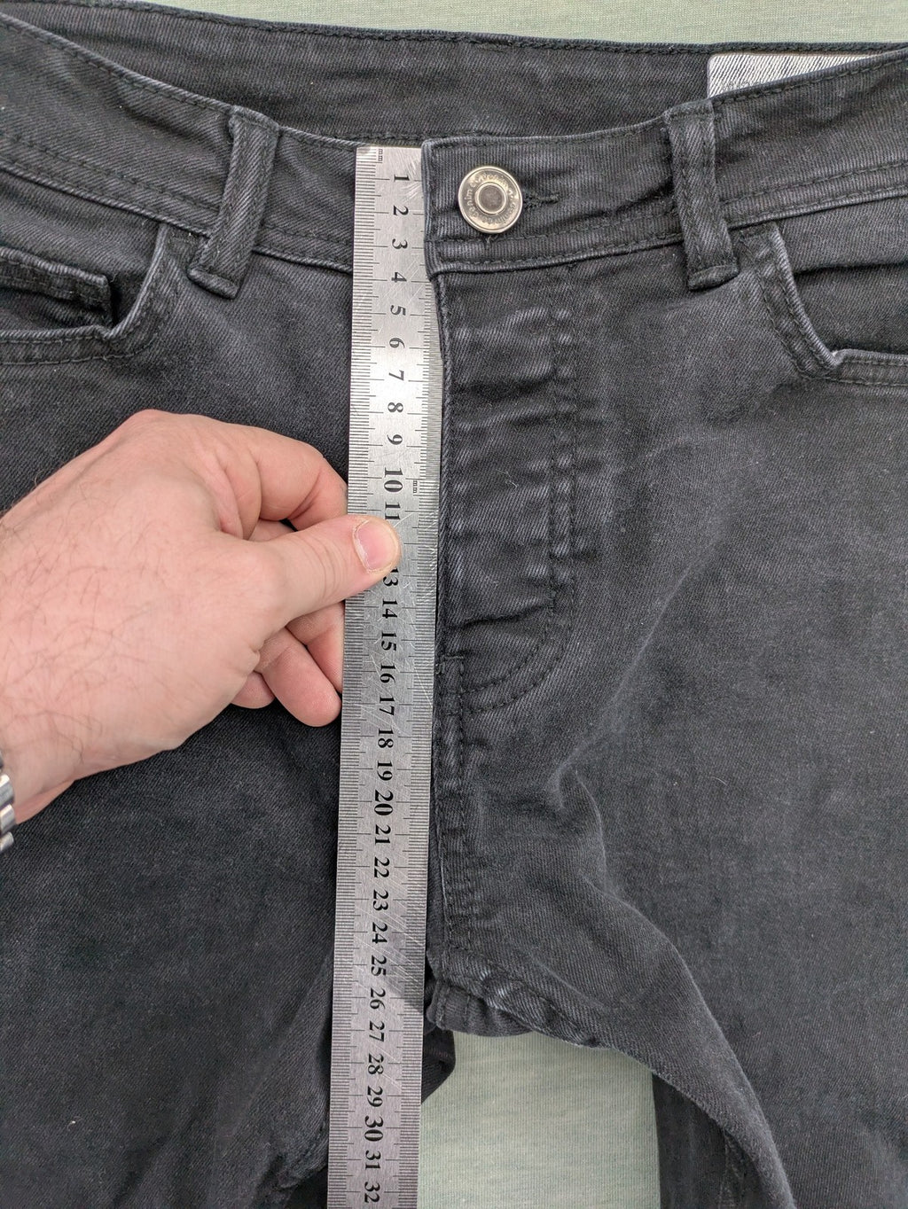 Denim & Co. grey slim fit jeans with button fly and classic 5-pocket design.