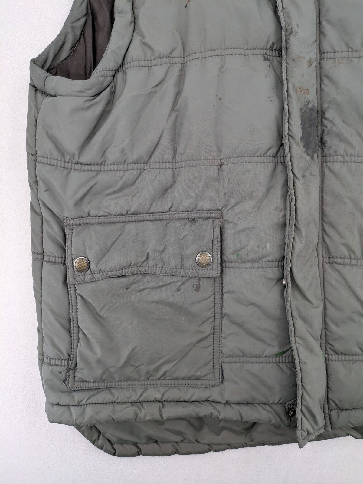 Camargue grey quilted jacket with fleece collar and buttoned pockets.