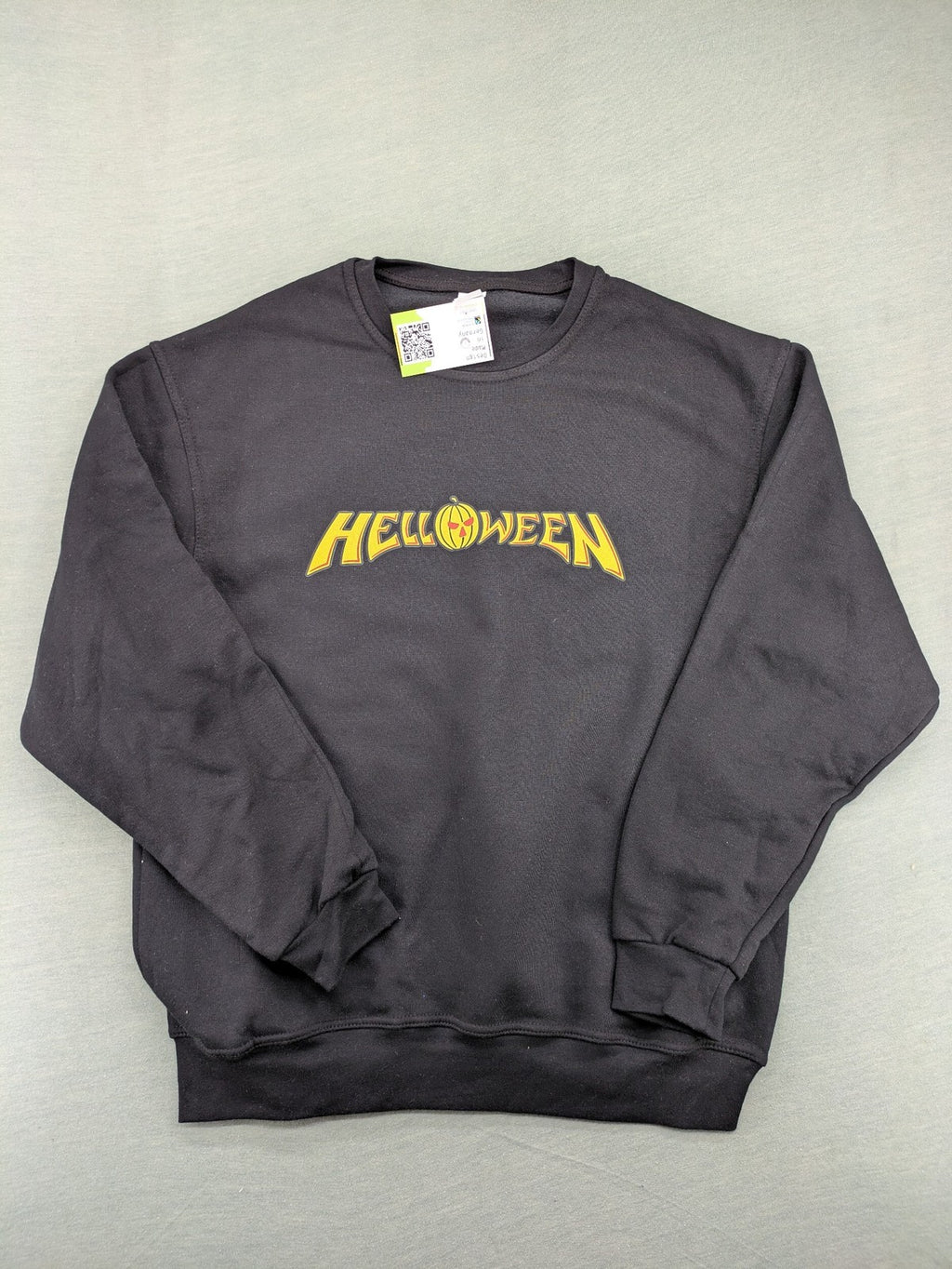 Helloween orange sweatshirt featuring iconic band logo in yellow, soft cotton blend material.