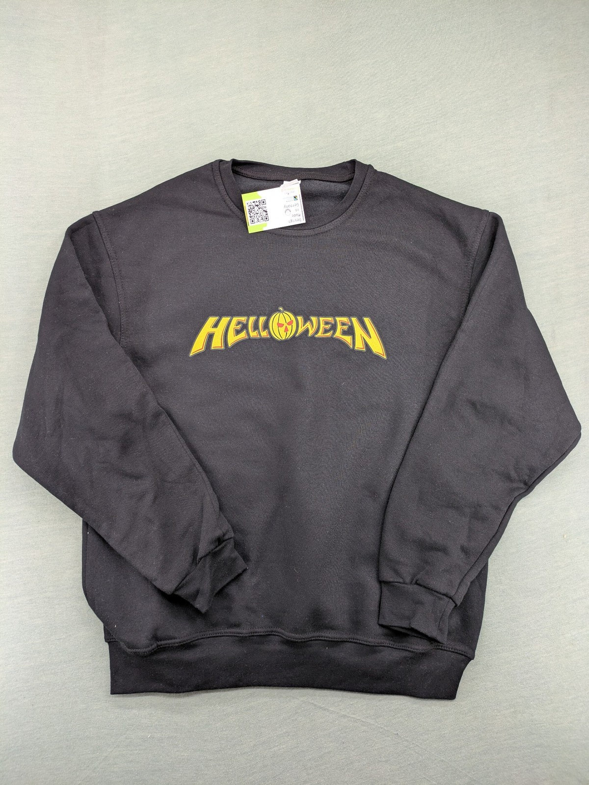 Helloween orange sweatshirt featuring iconic band logo in yellow, soft cotton blend material.