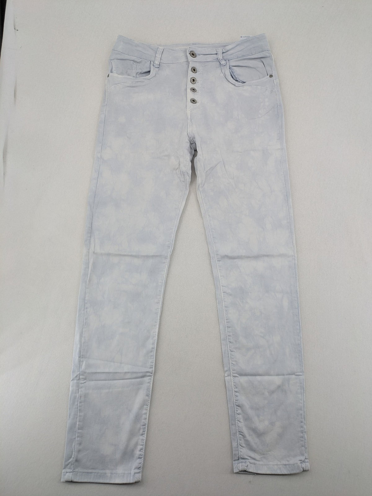 Yelly&Co blue and white batik pants with button fly, made from soft stretch fabric.