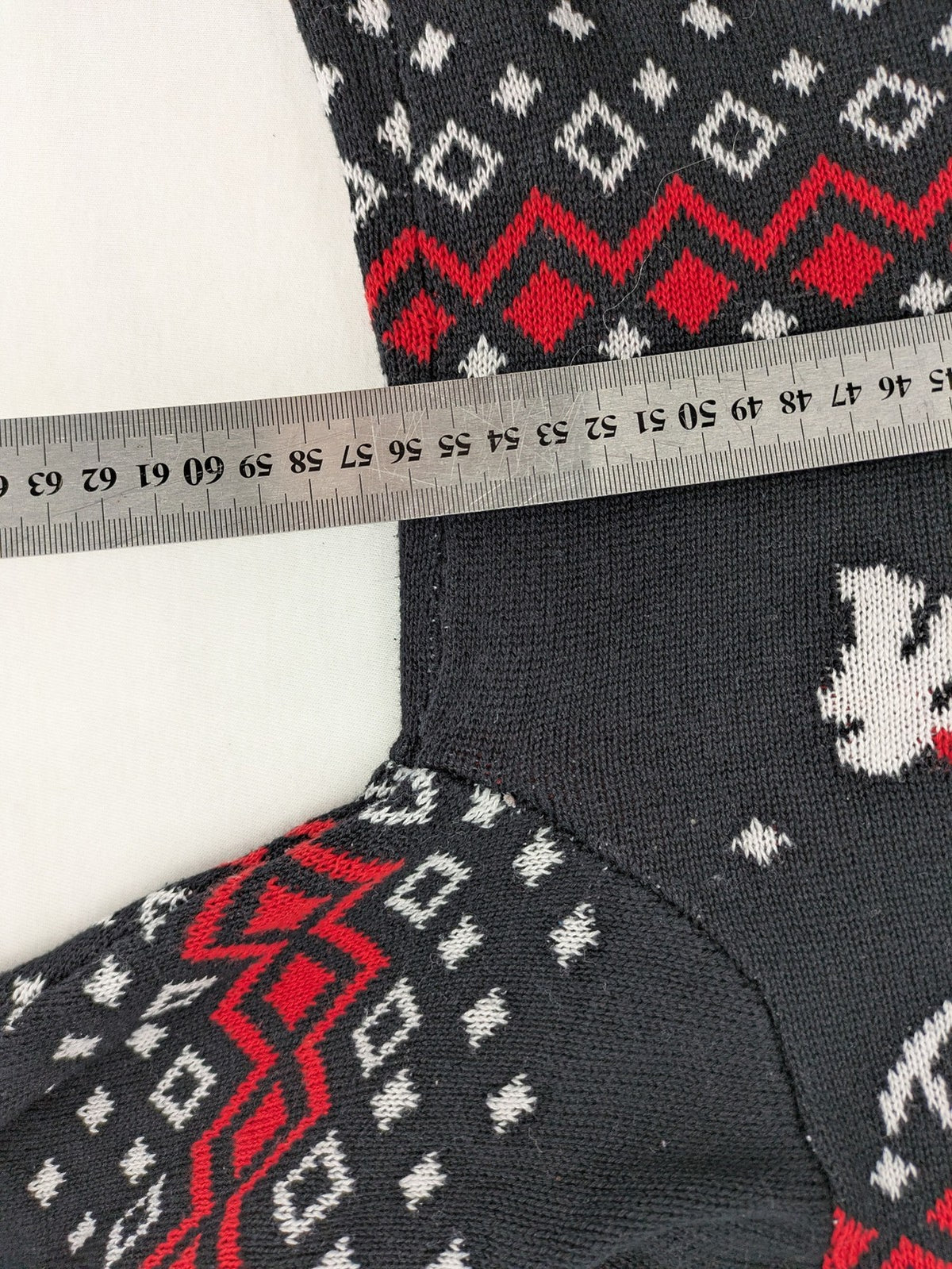 BPC Bonprix grey red white turtle neck jumper with reindeer Fair-Isle pattern and decorative buttons.