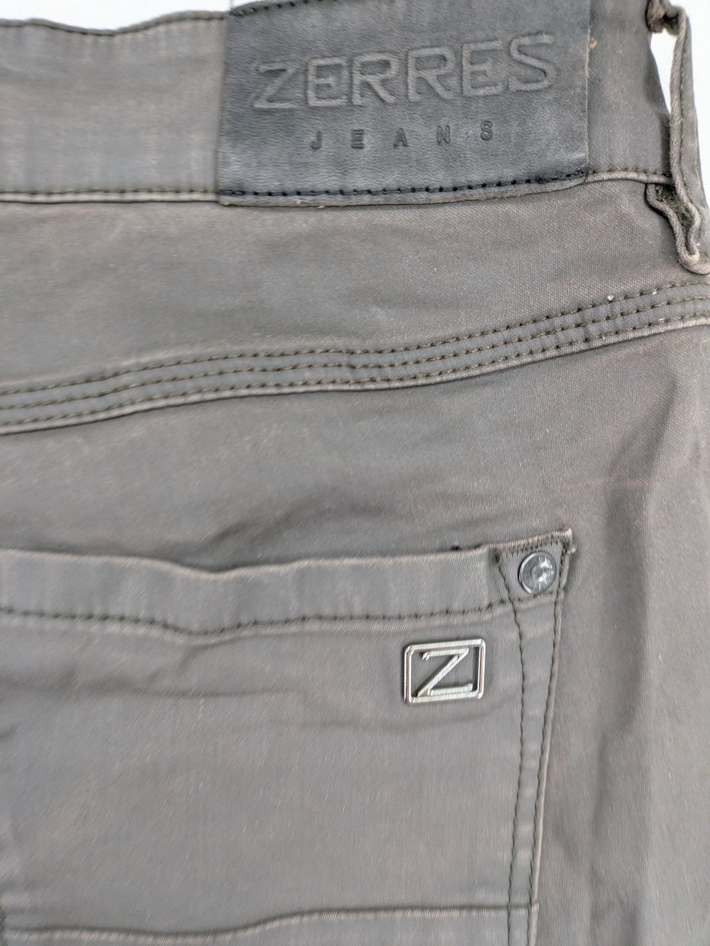 Zerres grey slim fit chino pants with ankle zippers and classic 5-pocket design.