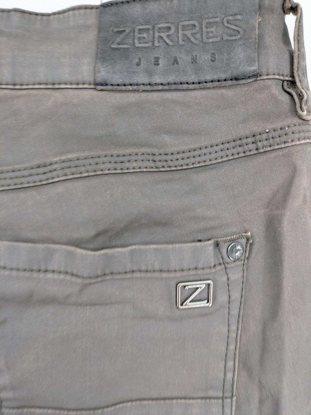 Zerres grey slim fit chino pants with ankle zippers and classic 5-pocket design.