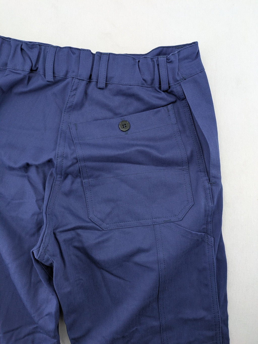 Uvex blue work pants 100% cotton with elastic waistband and straight leg design.