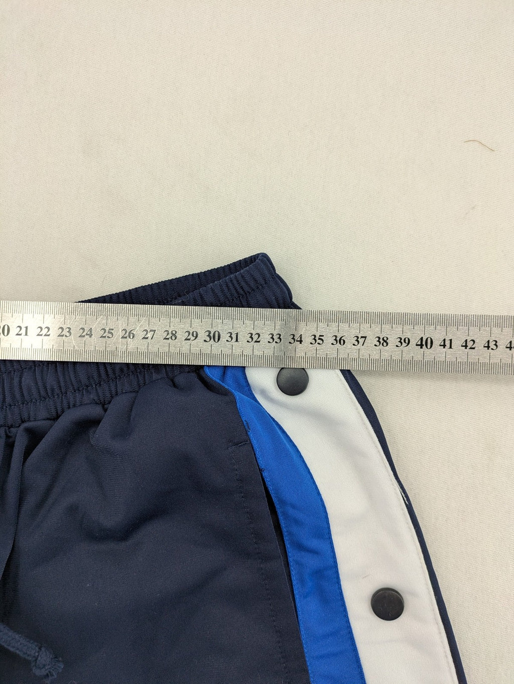 McORVIS blue tearaway training pants with side snap buttons and elastic waistband.