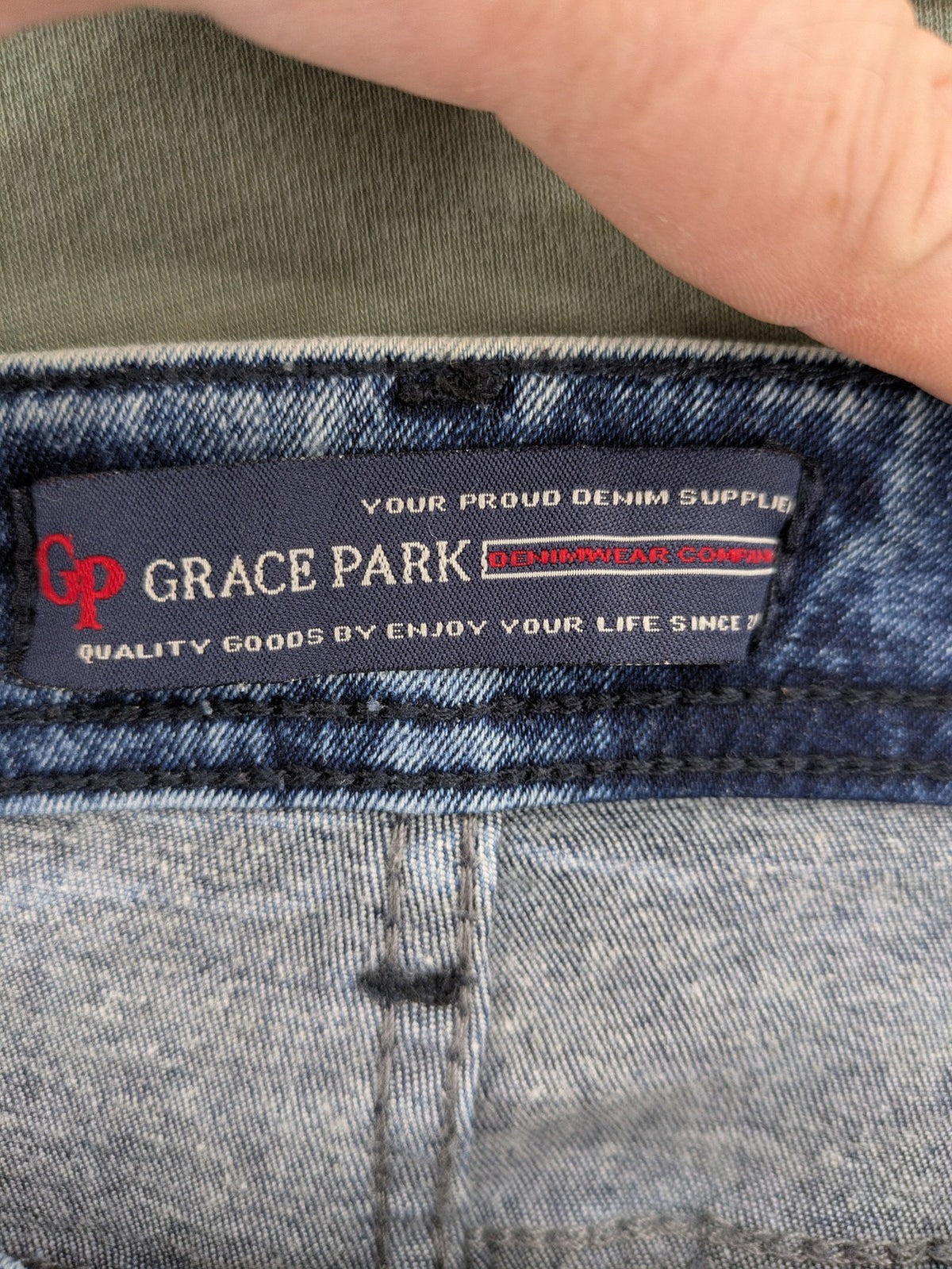 Stark straight jeans multi distressed acid wash with orange patches and side stripes.