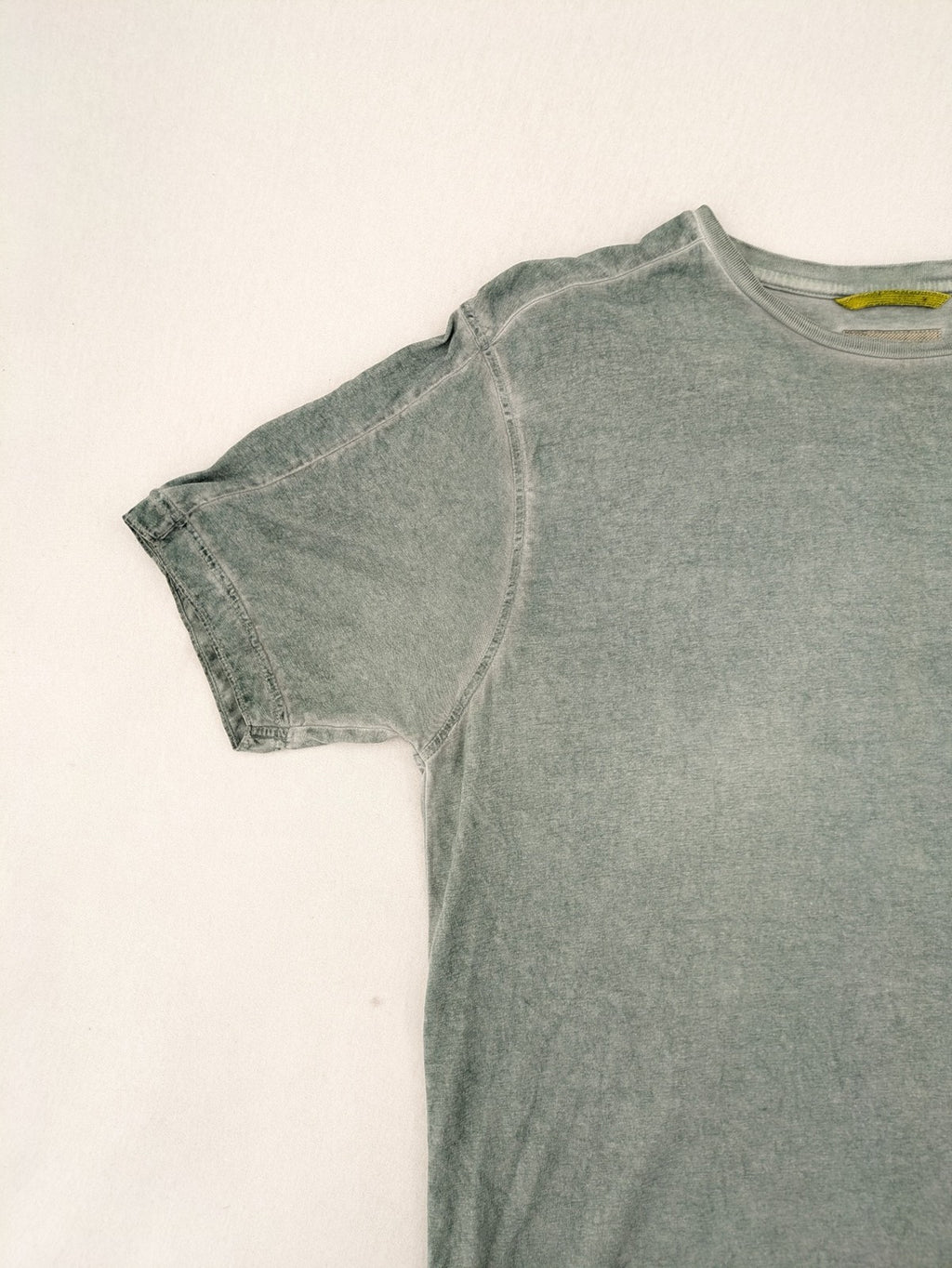 Camel Active green t-shirt with striped chest pocket and used look cotton fabric.