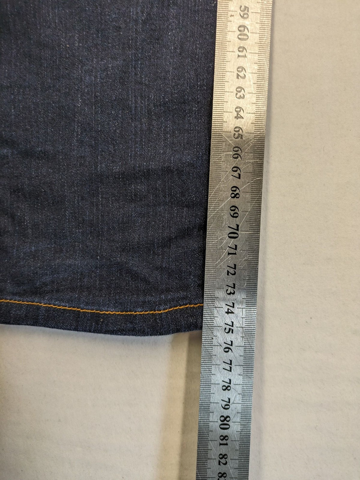 Okay blue straight jeans dark wash 5-pocket style with stretch material for comfort.