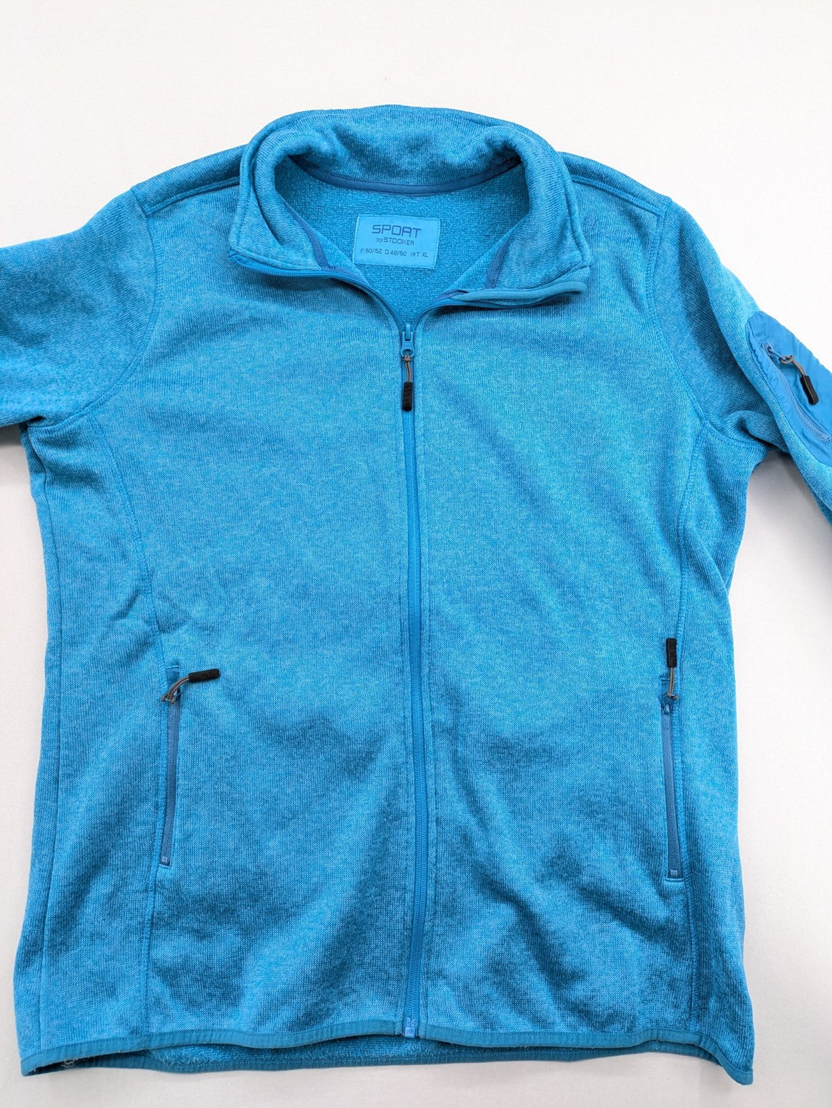 Stooker blue and turquoise fleece jacket with full zip and stand-up collar.
