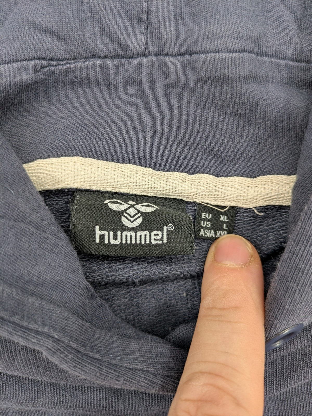 Hummel grey turtle neck jumper featuring large logo, kangaroo pocket, cotton blend material.