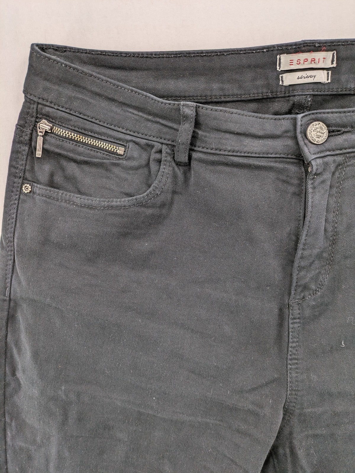 Esprit black skinny jeans with zipper details and cotton-stretch material.