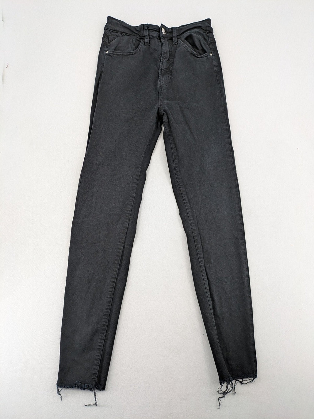 Stradivarius black skinny jeans high waist raw hem five-pocket style