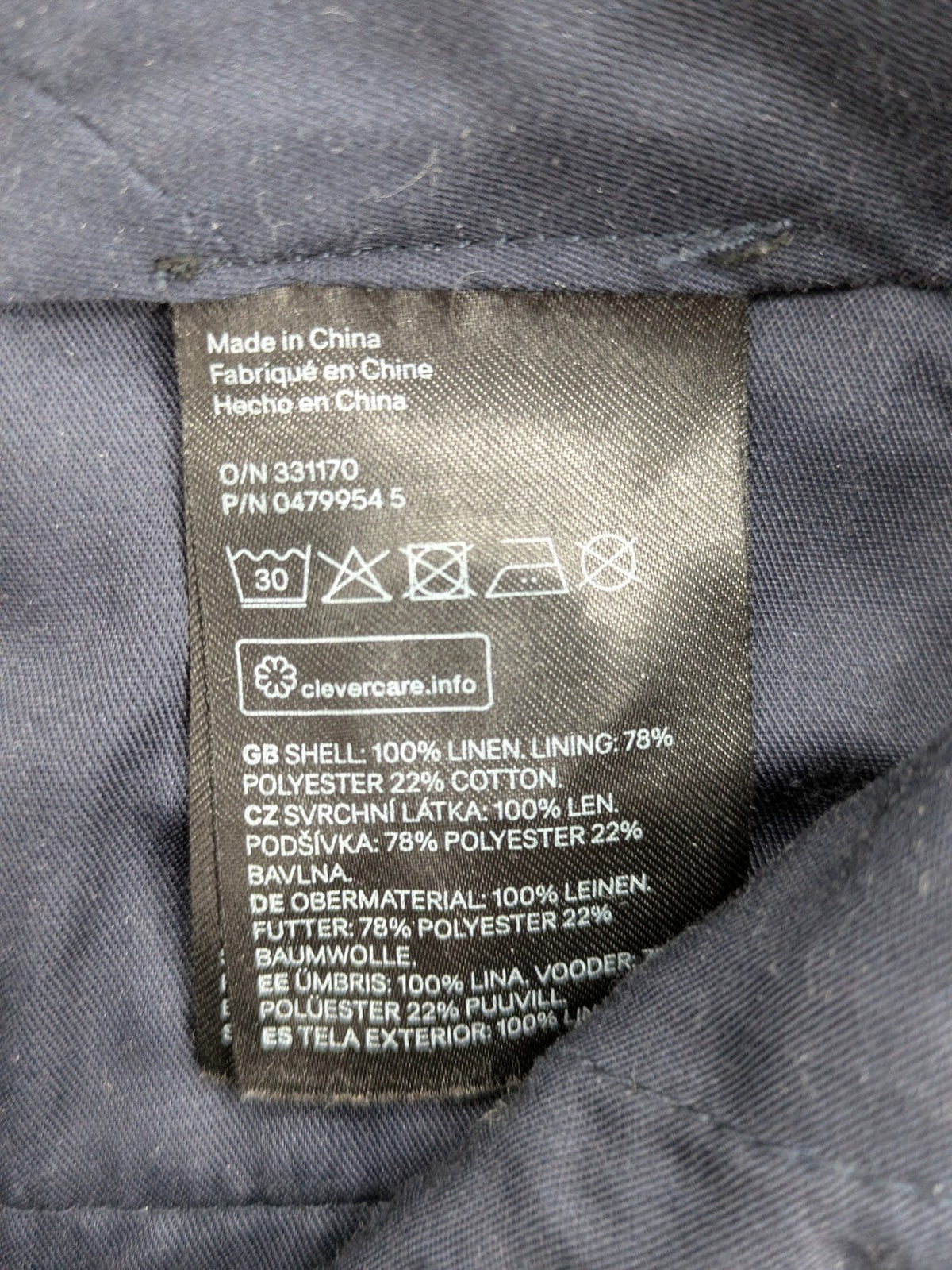 H&M blue linen shorts size 50 flat front design with practical pockets.