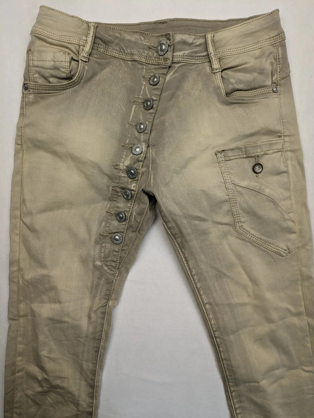 Mozaar beige straight jeans with unique asymmetrical button placket and practical pockets.