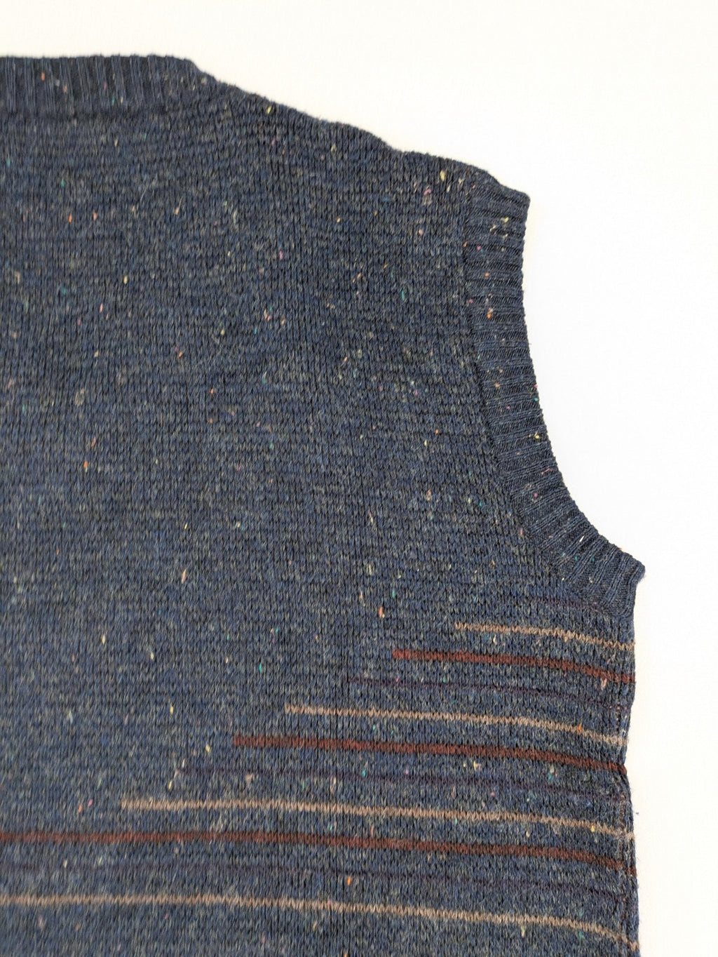 Angelo Litrico blue vest with V-neck, striped pattern, and textured melange design.