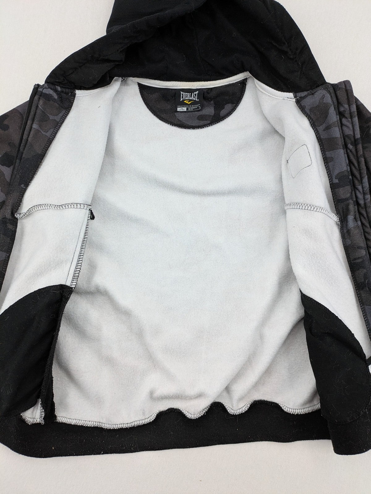 Everlast black grey camouflage jacket with full zip and attached hood.