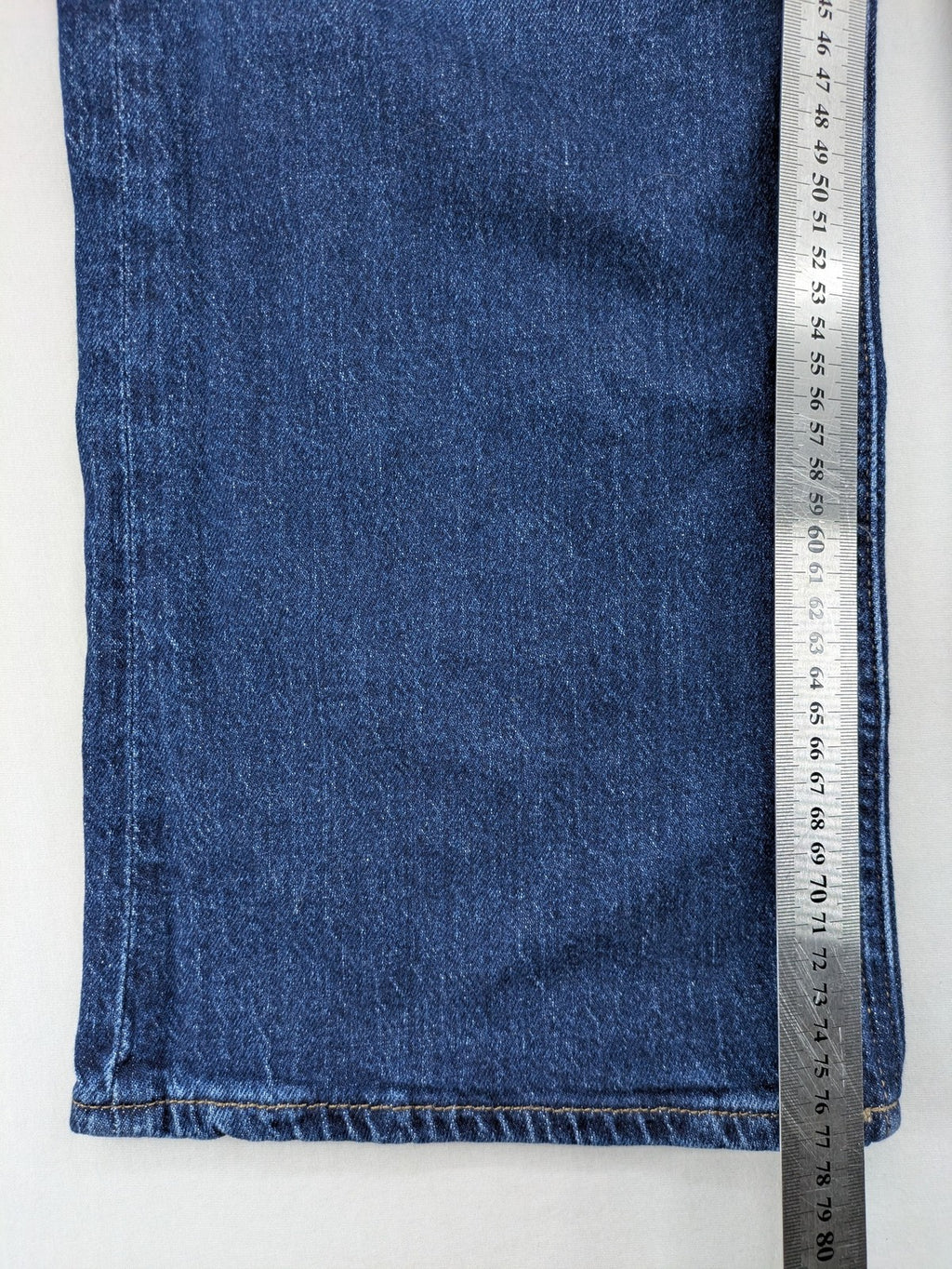 H&M blue wide leg high waist jeans with classic 5-pocket design and stretch denim.