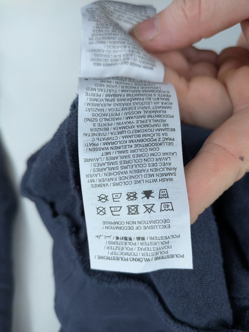 Hummel grey turtle neck jumper featuring large logo, kangaroo pocket, cotton blend material.