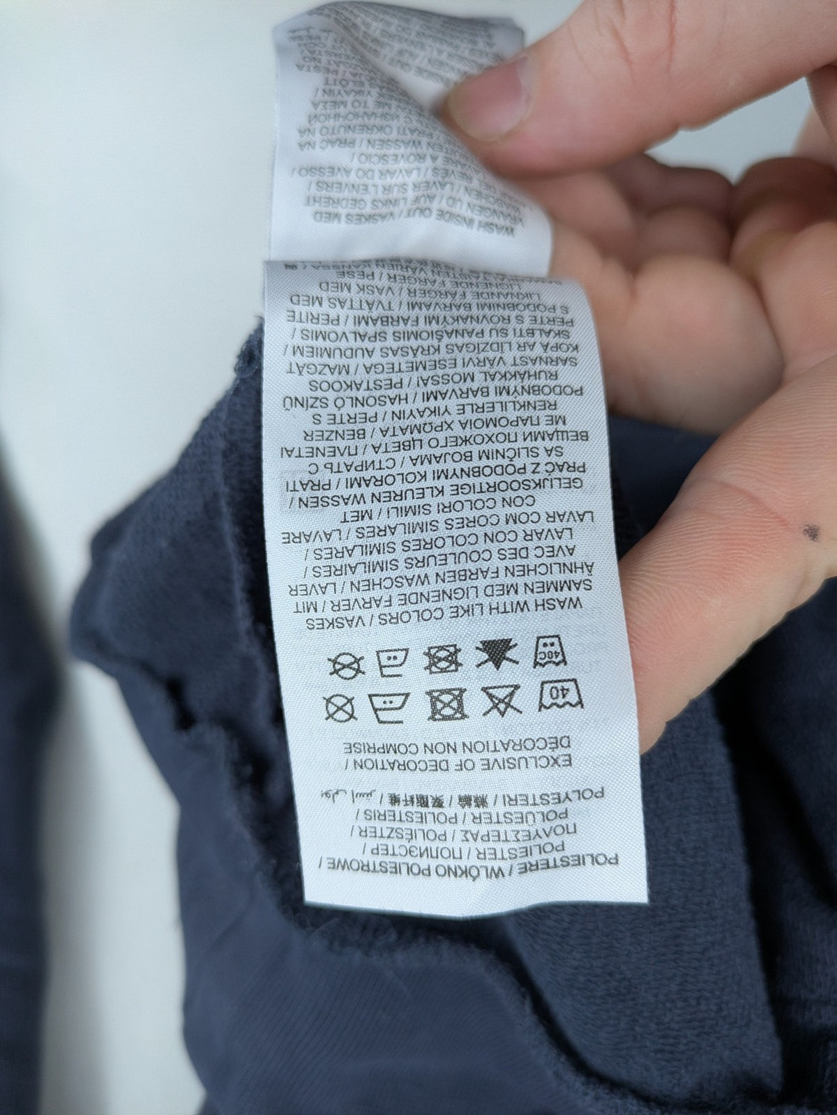 Hummel grey turtle neck jumper featuring large logo, kangaroo pocket, cotton blend material.