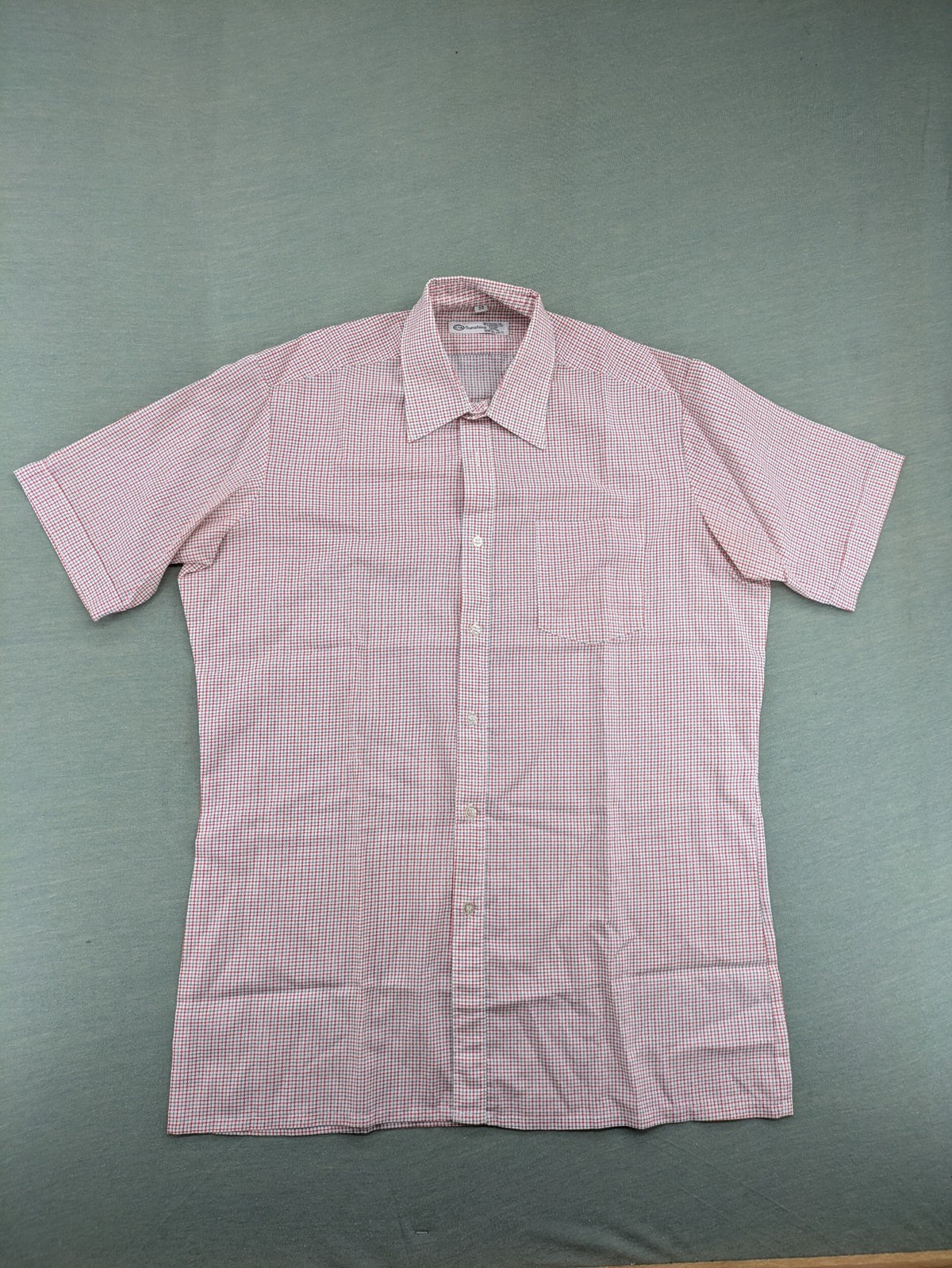 C&A short-sleeve shirt pink white checkered pattern, single chest pocket, polyester cotton blend.